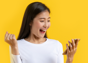 happy women approved loan by moneylender in SG