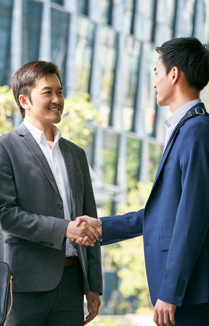 Prosper Credit staff shakes hand with a borrower after his money lender loan application discussion