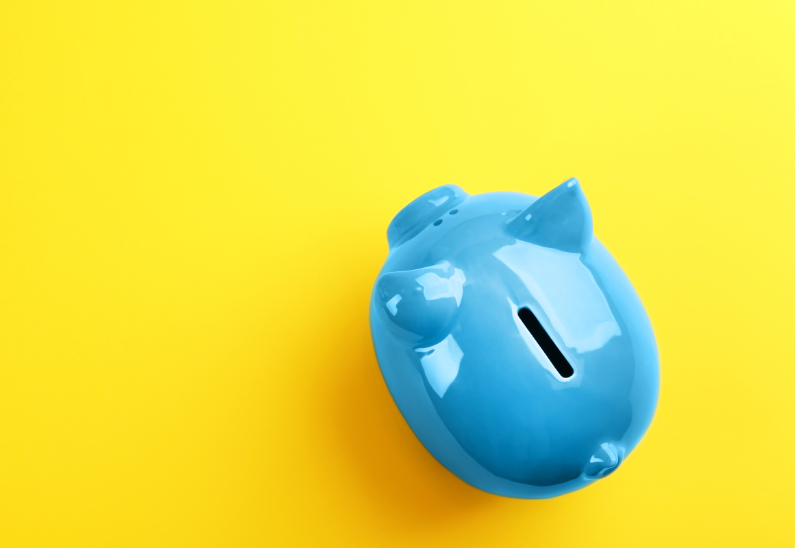 Empty blue piggy bank representing the possible need to file for bankruptcy when unable to repay a licensed money lender