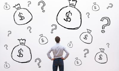 A borrower thinking about top questions asked when applying for a loan
